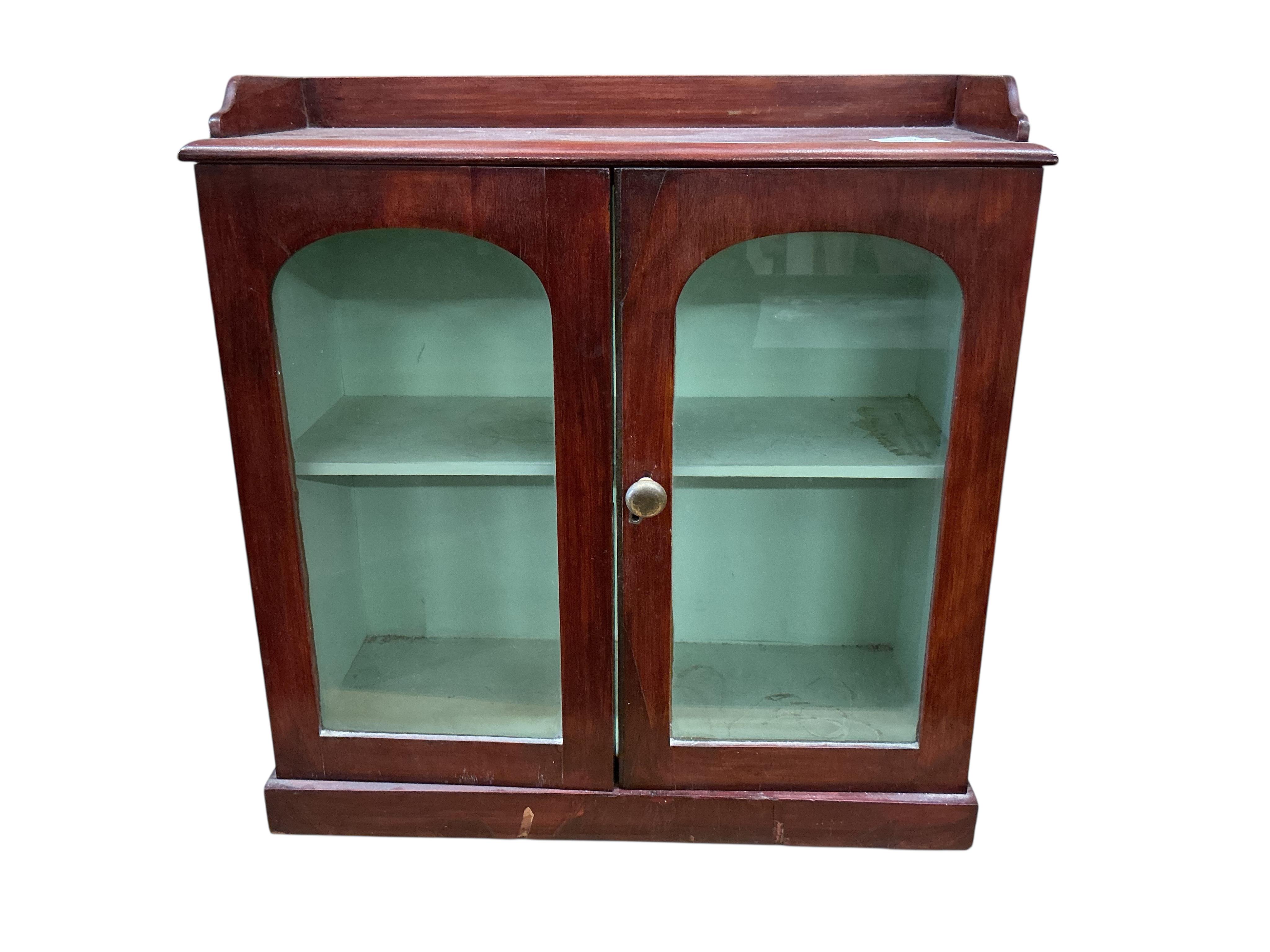 A Victorian mahogany glazed wall cabinet, width 51cm, depth 19cm, height 52cm